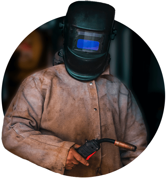 a man wearing a mask and holding a welding tool Equipment Rentals